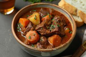 Goulash with tender beef, carrots and potatoes photo