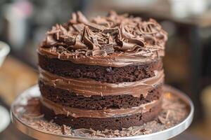 A superb chocolate cake with rich ganache and layers of chocolate crumbs. photo