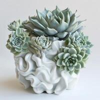 Contemporary ceramic vase showing a group of succulent sculptures. photo