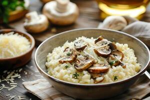 A delightful bowl of creamy risotto with mushrooms and parmesan cheese photo