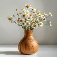 Handmade wooden vase showing a bouquet of daisies. photo