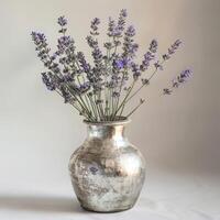 Glass vase holding a bunch of fragrant lavender photo
