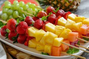 colorful fruit kebabs photo