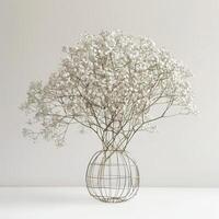 A quirky wire frame vase filled with clusters of flowers. photo