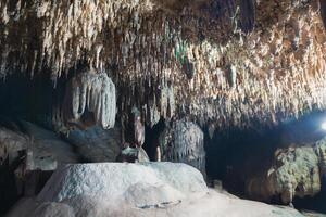 beatiful of Stalactite and Stalagmite in Tham Lay Khao Kob Cave in Trang, thailand. photo