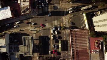 Cars traffic at crossroads. Auto road transport in city, top aerial view. photo
