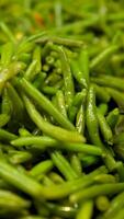 Green beans ready for cooking in frying pan. Bio green beans. cooking healthy home-made food mix vegetables video