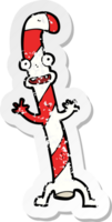 adesivo retrô angustiado de um desenho animado dançando o bastão de doces de natal png