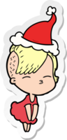 sticker cartoon of a squinting girl in dress wearing santa hat png