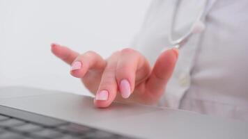 Close-up of female hand touching buttons of white computer keyboard video