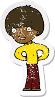 retro distressed sticker of a cartoon happy boy with hands on hips png