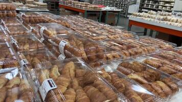 Costco Wholesale croissants bread pita bread delicious pastries Grocery huge selection of sales buy products in bulk come to supermarket each is sealed in a separate box transparent plastic packaging video