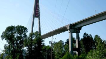 Skytrain Bridge, New Westminster Cityscape. A commuter rail bridge crosses the Fraser River into New Westminster. British Columbia, Canada. video