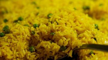 turmeric rice pilaf Contour effect of Taste Uzbek Cuisine Soulful Wedding Pilaf. It is beautifully decorated with eggs and sausage. 4k video