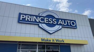 main entrance to the shop building sign Princess Auto Ltd. is a Canadian retail chain specializing in farm, industrial, garage, hydraulics and surplus items. video