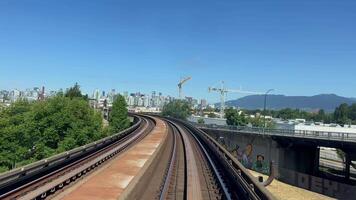 main street science world station Vancouver, BC Canada Sky Train station new train arriving and departing from the station people waiting unrecognizable bright Hall great weather video