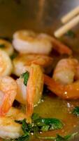 Preparing shrimp with a close-up view. Fresh Asian food ready for consumption video