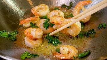 Preparing shrimp with a close-up view. Fresh Asian food ready for consumption video