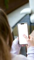 cell phone blank white screen mockup.hand holding texting using mobile on desk at office.background empty space for advertise.work people contact marketing business,technology video