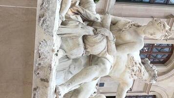 This allegorical sculptural group was one of those that symbolize the rivers of France that are worshipped at the bottom of the Parc Marly. the Loire River. two children 2023 Paris video