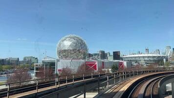 Downtown Vancouver, British Columbia, Canada Skytrain passing in the modern city during Science World video