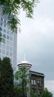 vancouver, antes de Cristo Canadá con vista a céntrico Vancouver desde parte superior de Vancouver giratorio restaurante durante puesta de sol en verano video