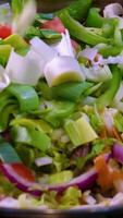 adding chopped garlic and ginger to beef in a frying pan frying raw meat in olive oil close-up Oriental food vermicelli Wok start of cooking hot oil splashes raw meat during cooking video