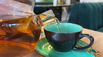 Aroma Antioxidant Tea In Kettle. Brewed Oolong Leaf. Cozy Warm Breakfast Teakettle. Brewing Fruit Tea English Tradition. Refreshment Beverages At Morning. Breakfast Service Hot Tea Darjeeling Leaves video