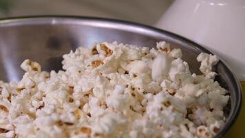 delicious sweet popcorn with lots of caramel, caramel flavor of popcorn close-up video