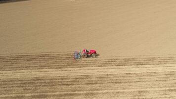 Tractor working in the Field Aerial View video