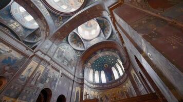 Cathedral of the Resurrection of Jesus Christ.Action.The ceiling of a huge beautiful church on which many icons are painted and huge ceilings with windows. video