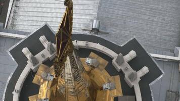 Top view of star on spire of city building. Stock footage. Russian symbol of star on spire of city building. Towering symbolism on star-shaped spire on roof of historic building video