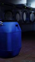 A blue barrel in a laundry room video