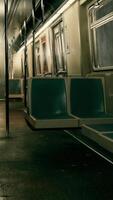 Dimly Lit Subway Car With Empty Seats video