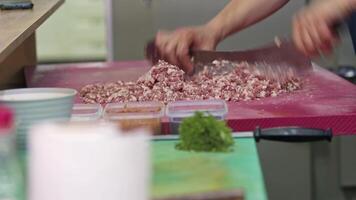 Adana Kebab Master Turns Lamb Meat into Minced Meat with an Armor Knife Footage. video