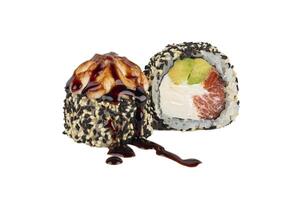 Sushi roll on a white background with Philadelphia cheese, tuna in sesame crumbs, sprinkled with soy sauce. photo