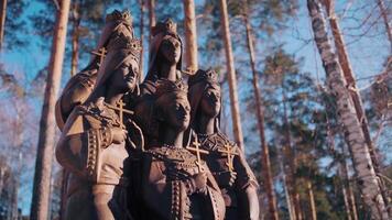 Monument to the Royal family of Tsar Nicholas II in Yekaterinburg, Ganina Yama. . Memorial of Romanov family on the background of trees and blue sky. video