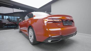 Germany, Berlin - March 2021. Exterior stylish design of car mode. Action. Stylish bright design of new car from Audi company. Shiny and bright new car color video