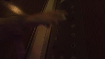 Close up of a female hand presses the elevator buttons. Stock footage. Selection of the 8 and 9 floors inside an old fashioned elevator with colorful flashing lights. video