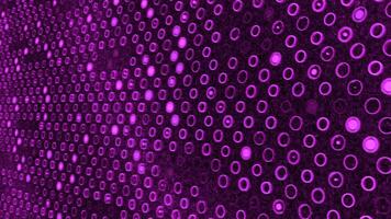 Background of colored pulsating circles. Animation. Electronic background with lots of flashing small circles. Colored background with flashing circles video