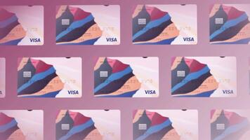 Abstract stack of Visa credit and debit cards on colorful background. Motion. Rows of bank cards illustrating new design, concept of money and online payment. video