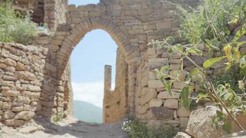 Aerial view of the ancient ruins of the stone city. Action. Archaeological park with old beautiful buildings on a sunny day, concept of history. video