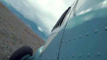 The nose of the helicopter. Clip. An iron large helicopter that is about to take off . video