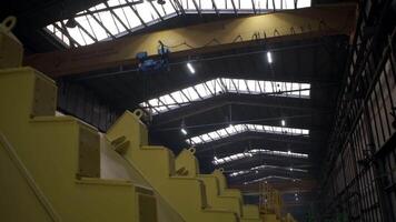 Overhead crane in production.Clip. Work at the factory with the help of equipment video