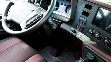 Close up of modern interior of a luxurious car. Scene. View from inside of car interior with the beautiful panel board of the passenger vehicle. video