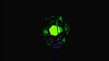 Abstract rotating glass transparent icosahedron figure with a glowing cube inside on a black background. Design. Geometric shape with triangular faces surrounded by moving swarm of particles. video