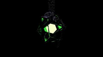 Abstract rotating glass transparent icosahedron figure with a glowing cube inside on a black background. Design. Geometric shape with triangular faces surrounded by moving swarm of particles. video