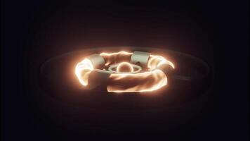 Bright glowing fire circular shapes inside black metal ring. Design. Rotating burning core surrounded by energy ring on a black background, seamless loop. video