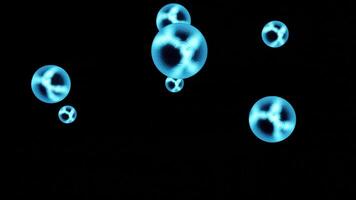 Rotating spheres with energy lines on abstract black background, seamless loop. Design. Spinning blue translucent molecules. video