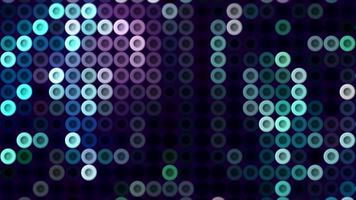 Colorful dots move in mosaic in computer space. Motion. Beautiful mosaic background of glowing dots moving in retro style. Computer game animation with neon retro dots video